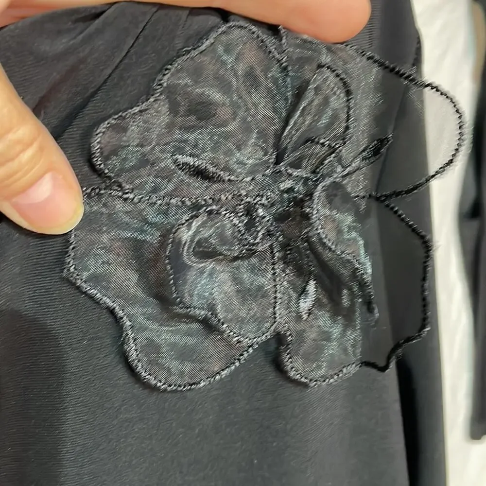 Brittany Black 2x waterfall neckline 3d flower appliqué like new tunic style